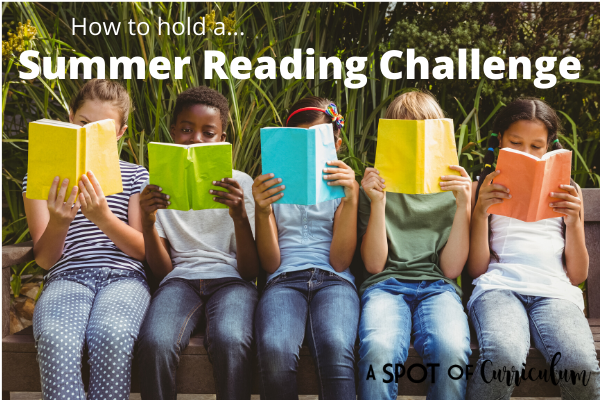 five students reading books in a park