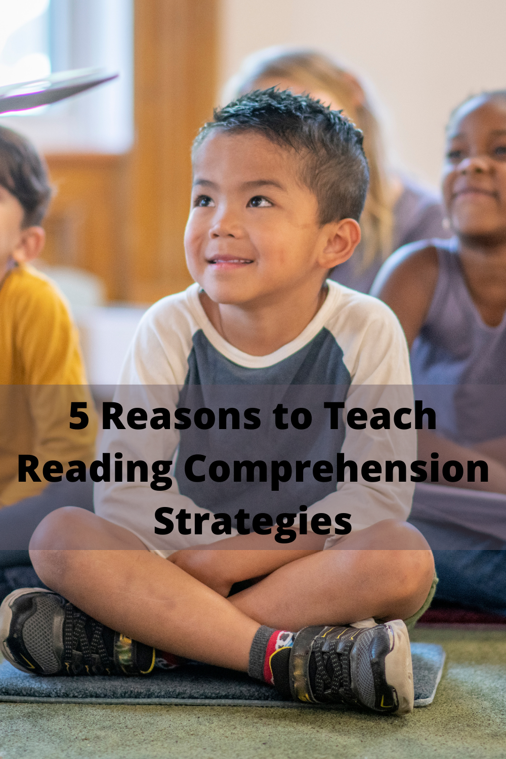 a boy sitting smiling with the words 5 reasons to teach reading comprehension strategies